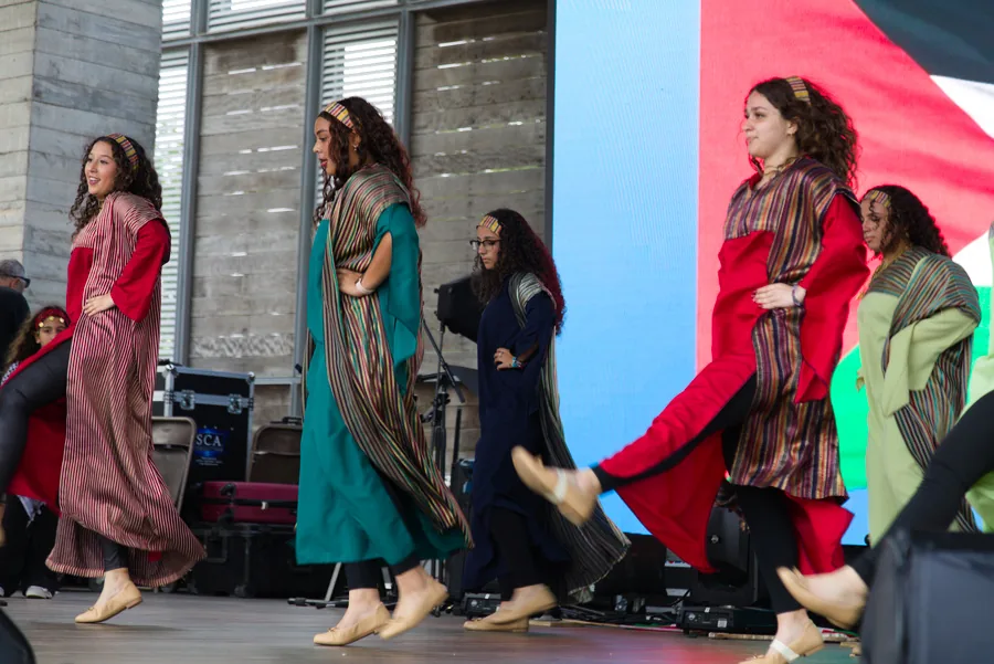 Women presenting Palestinian dress and dance on the 2025 festival stage