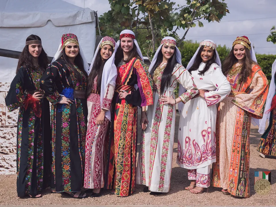 Women wearing regional Palestinian traditional dress at the 2019 Houston Palestinian Festival